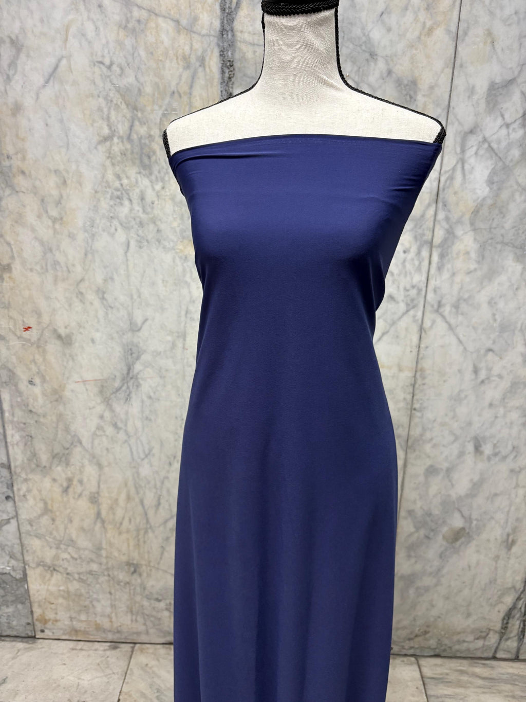 Navy ITY spandex fabric is an excellent choice for evening wear, known for its smooth texture and elegant drape. Sell by 1 yard increment.