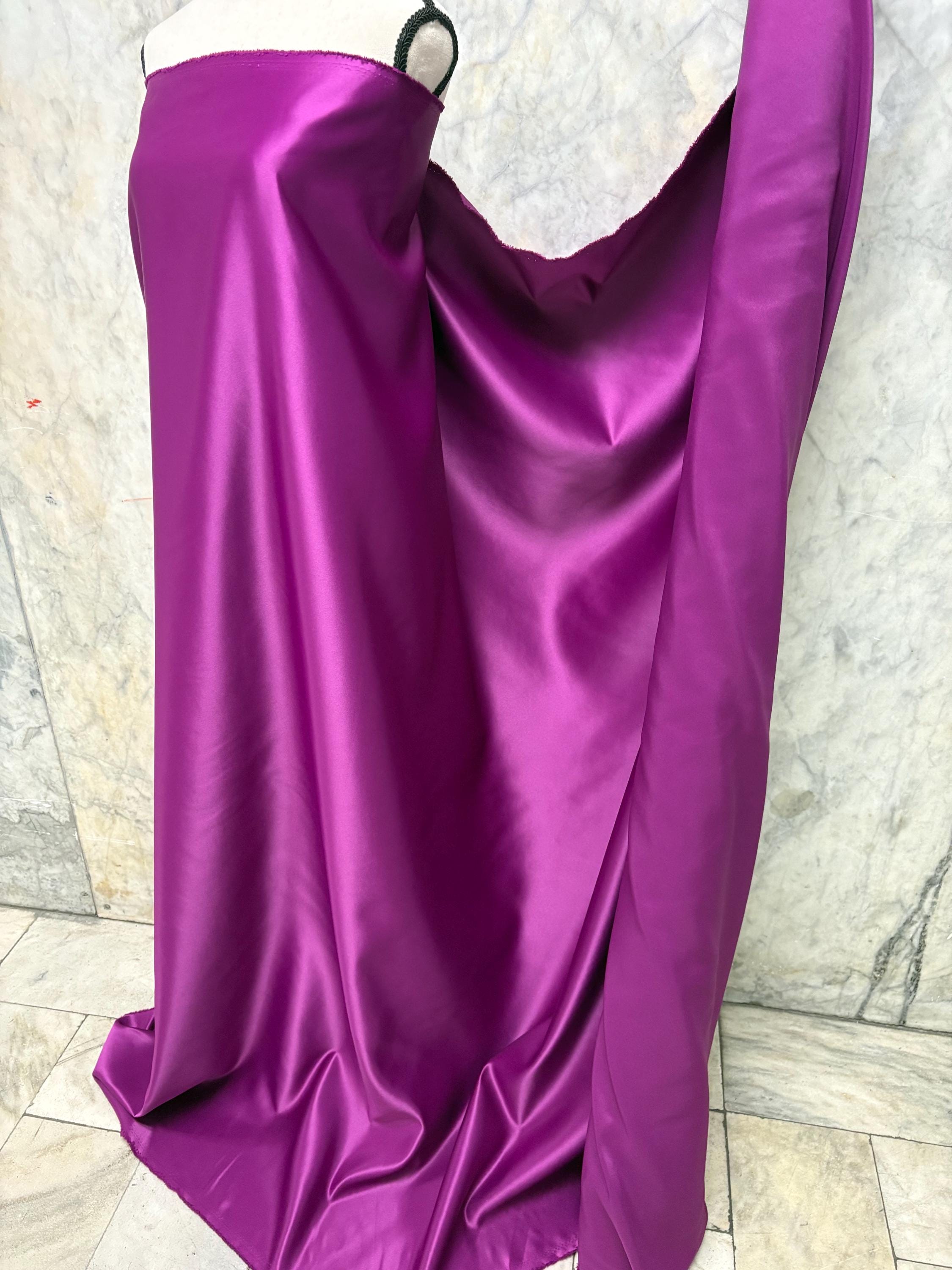Bridal Satin Color Magenta 1473 dull finished, Polyester width 58/60" . Great for gown and suits, party formal dress.