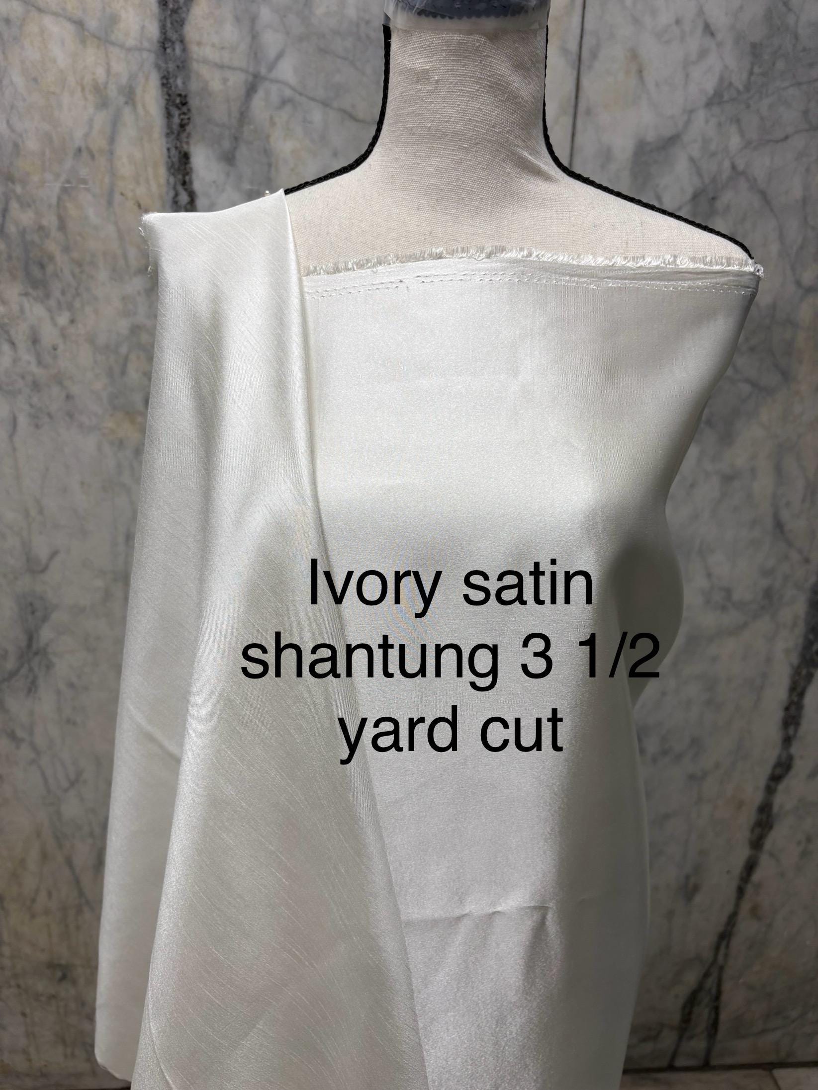 A 3.5 yards cut fabric satin shantung color ivory, double sided fabric width 58 inch. polyester