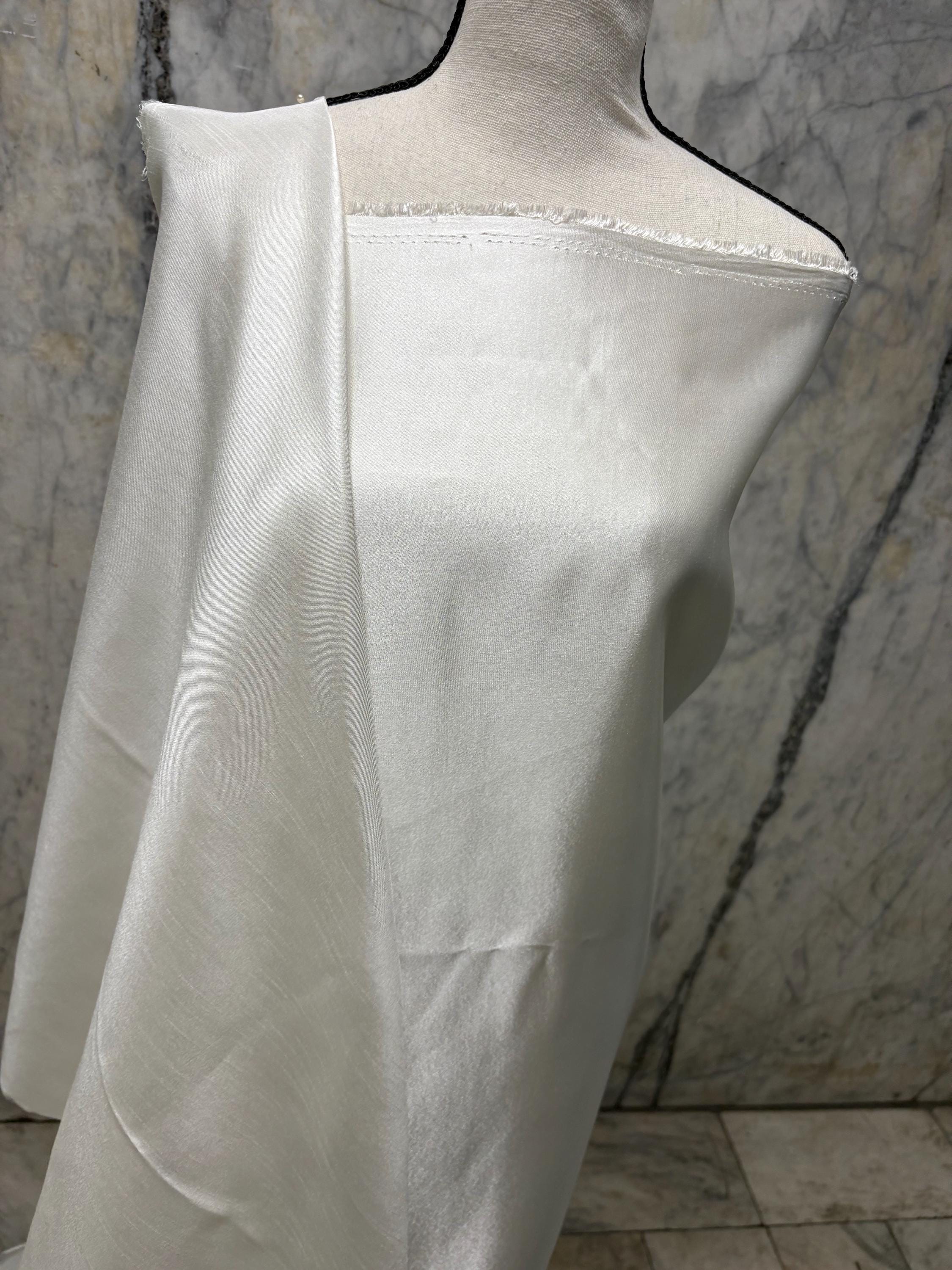 A 3.5 yards cut fabric satin shantung color ivory, double sided fabric width 58 inch. polyester