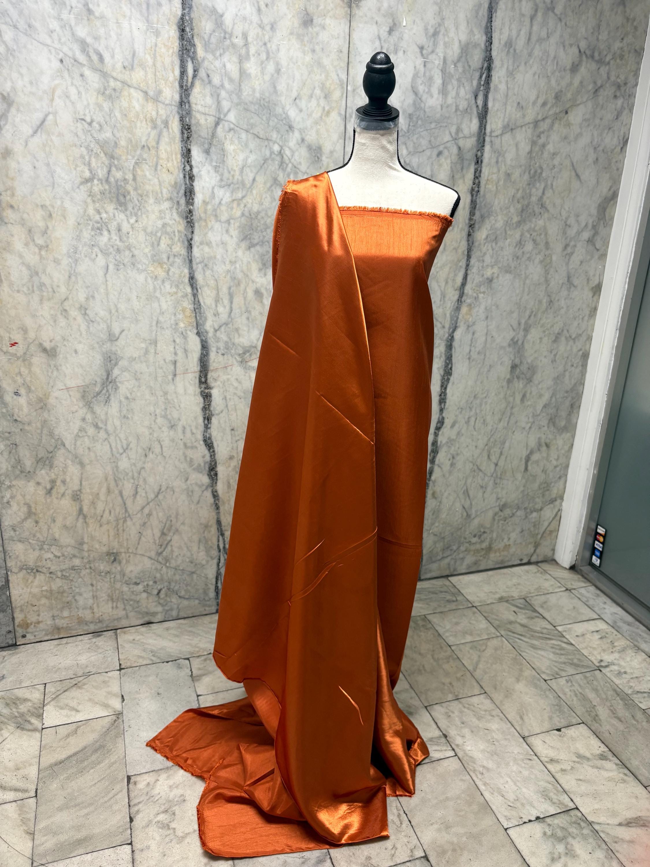 A 3.5 yards cut fabric satin shantung color Rust, double sided fabric width 58 inch. polyester