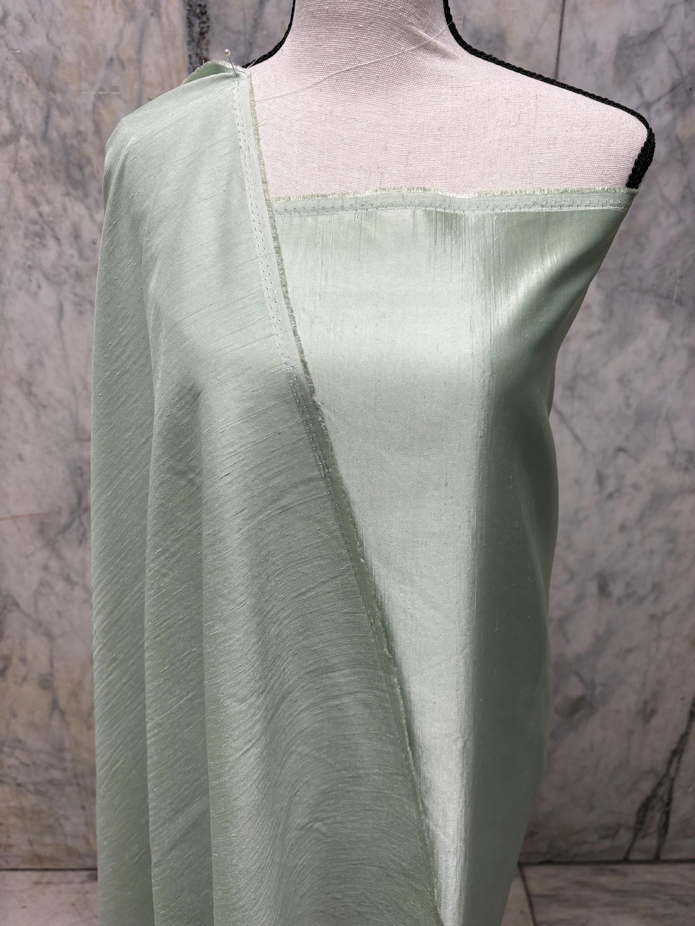 A 2 3/4 yards cut fabric satin shantung color Lt. sage, double sided fabric width 58 inch. polyester