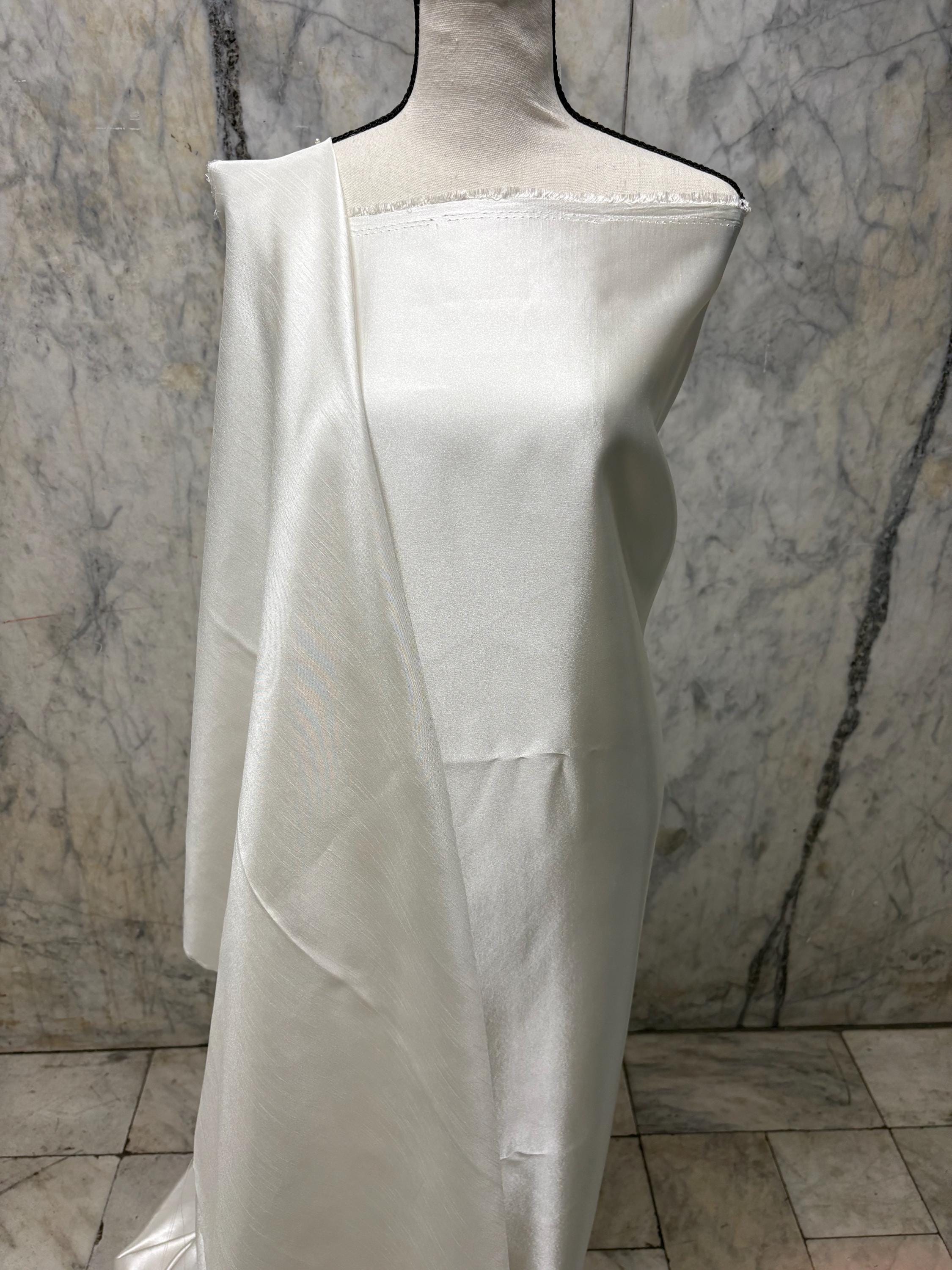 A 3.5 yards cut fabric satin shantung color ivory, double sided fabric width 58 inch. polyester