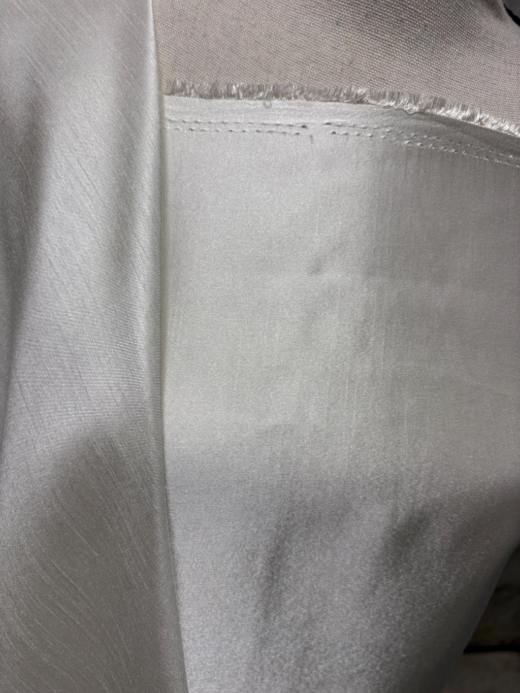 A 3.5 yards cut fabric satin shantung color ivory, double sided fabric width 58 inch. polyester