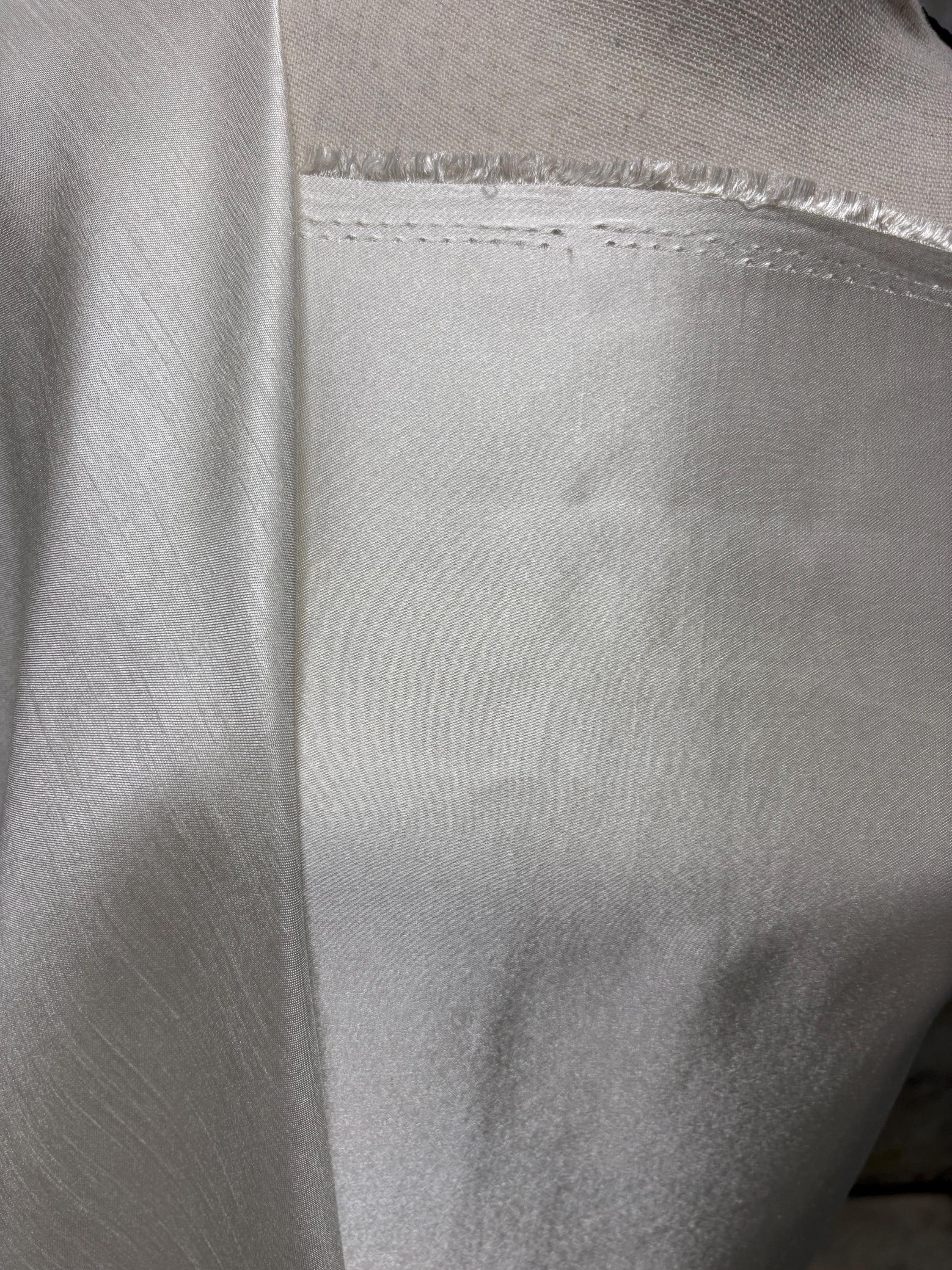 A 3.5 yards cut fabric satin shantung color ivory, double sided fabric width 58 inch. polyester