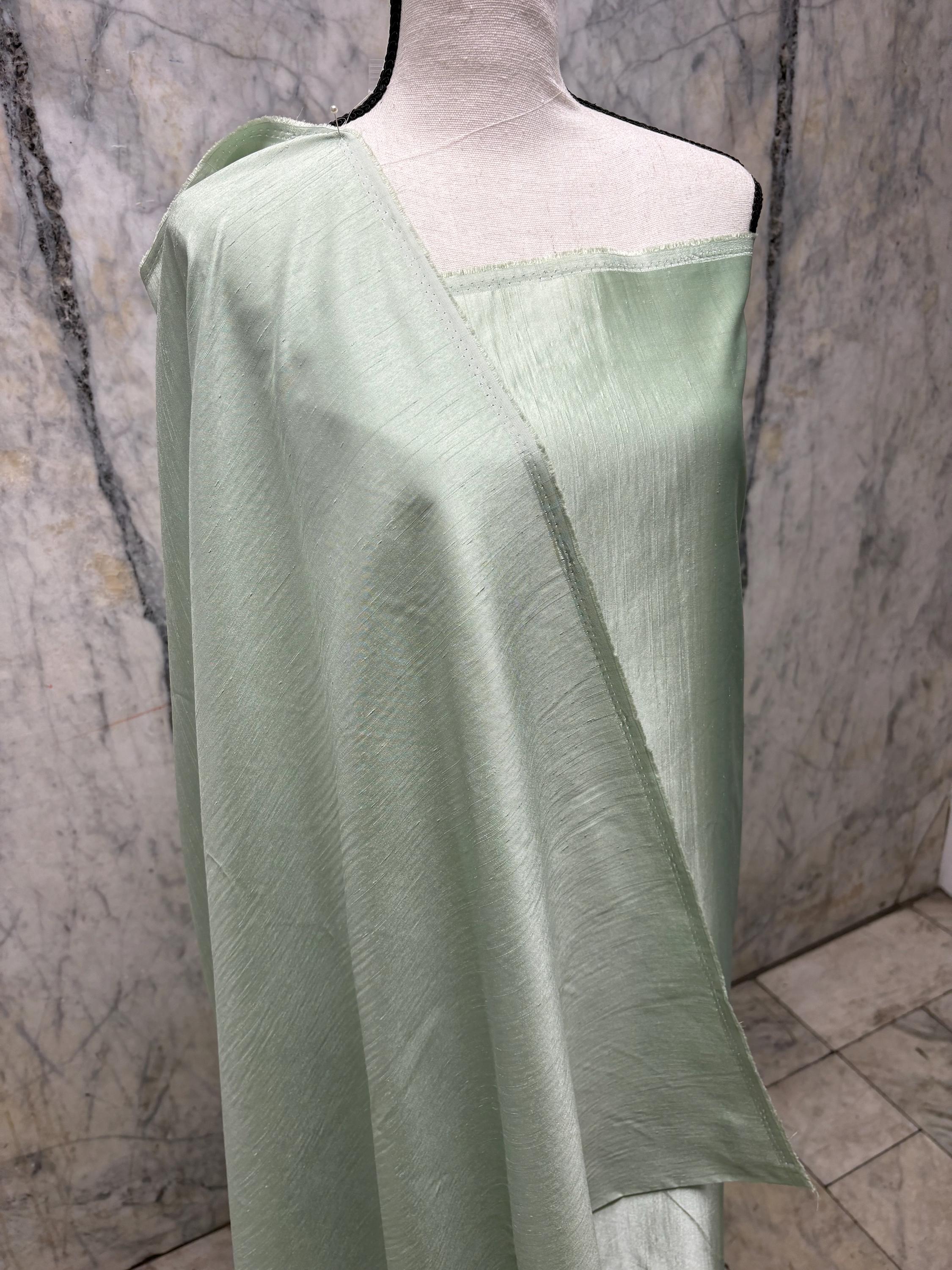 A 2 3/4 yards cut fabric satin shantung color Lt. sage, double sided fabric width 58 inch. polyester