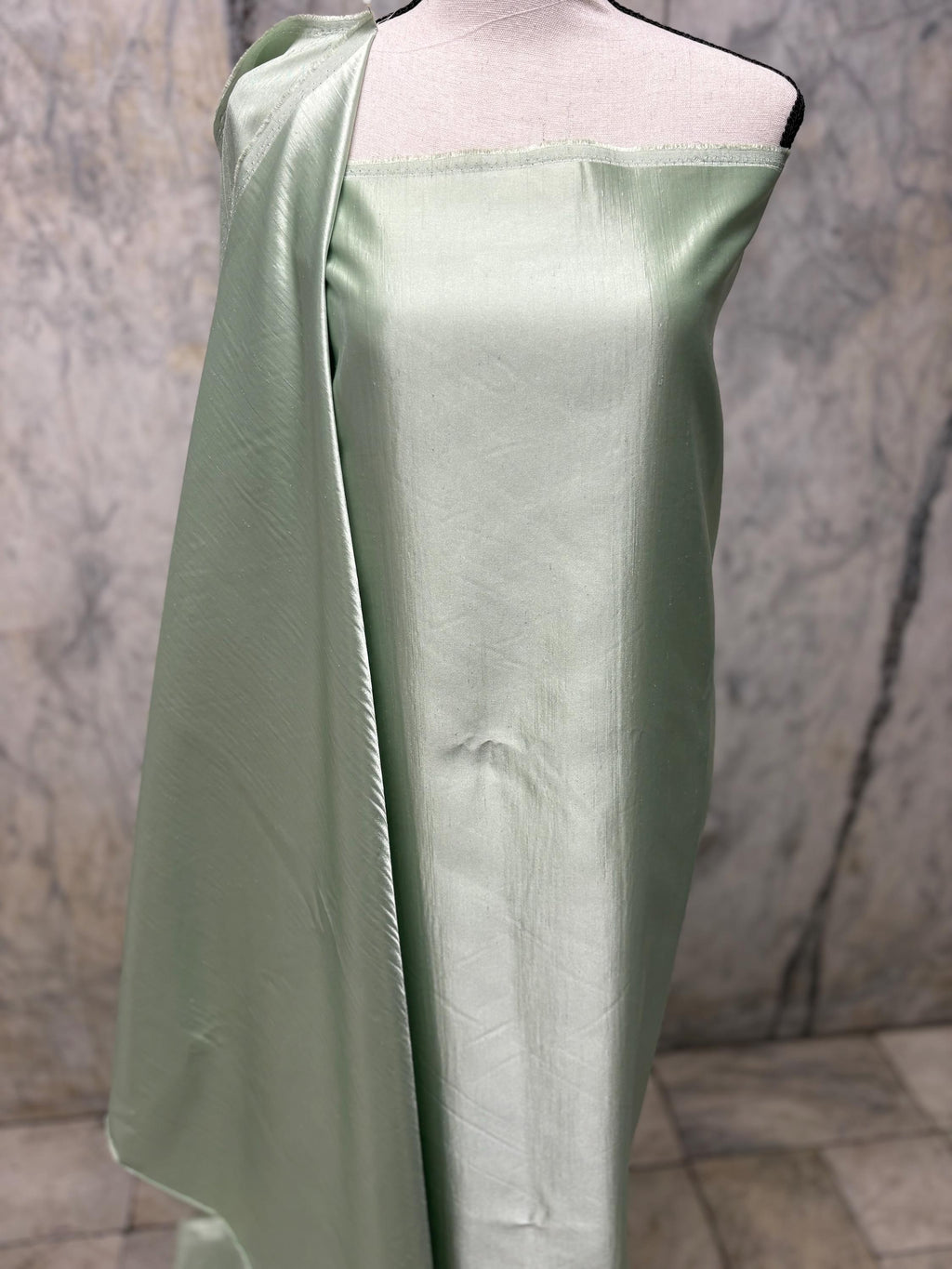A 2 3/4 yards cut fabric satin shantung color Lt. sage, double sided fabric width 58 inch. polyester