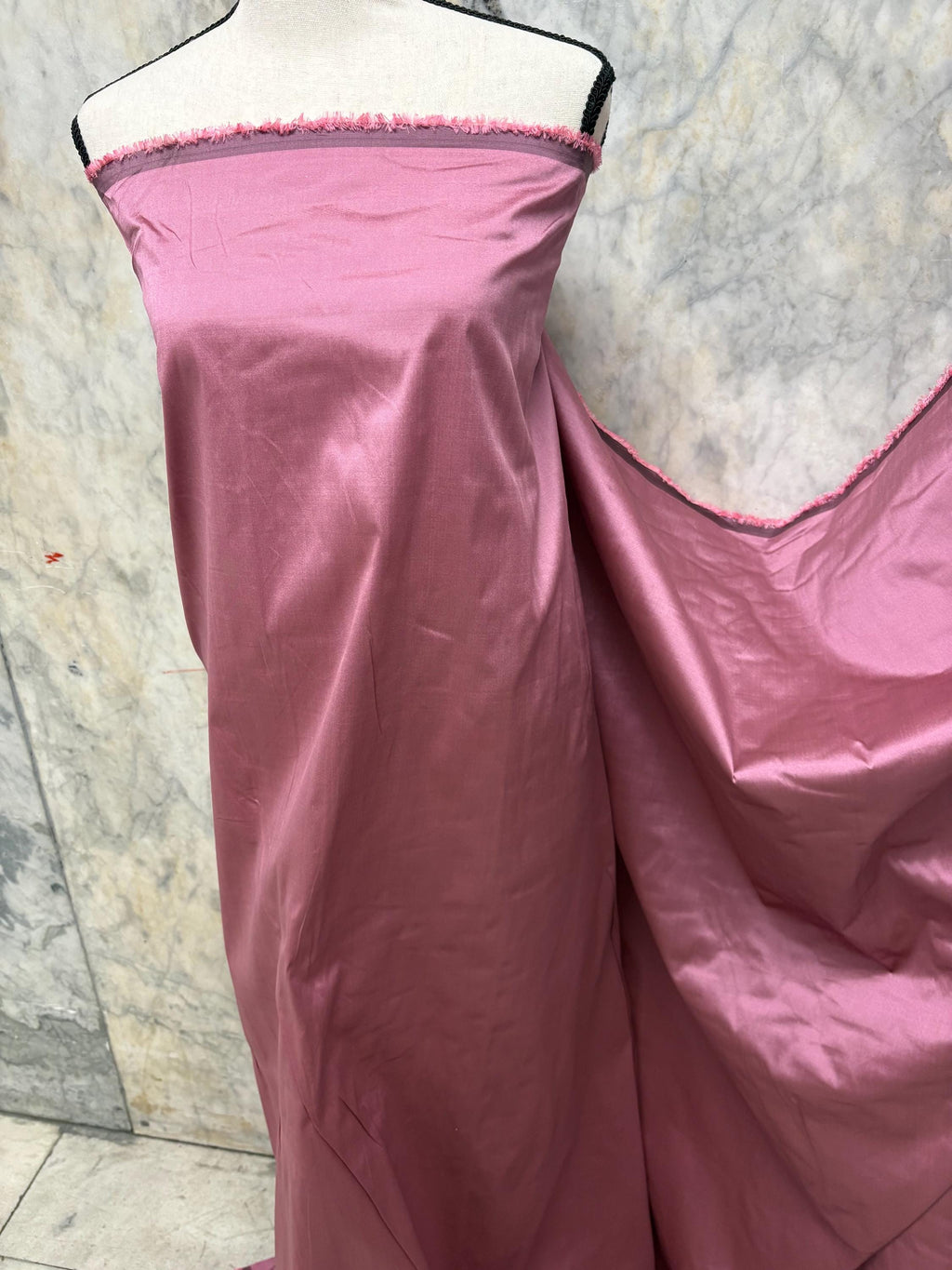 2-yard cut of rust taffeta fabric, 58" wide, polyester. Features a black undertone, perfect for party dresses and formal wear.