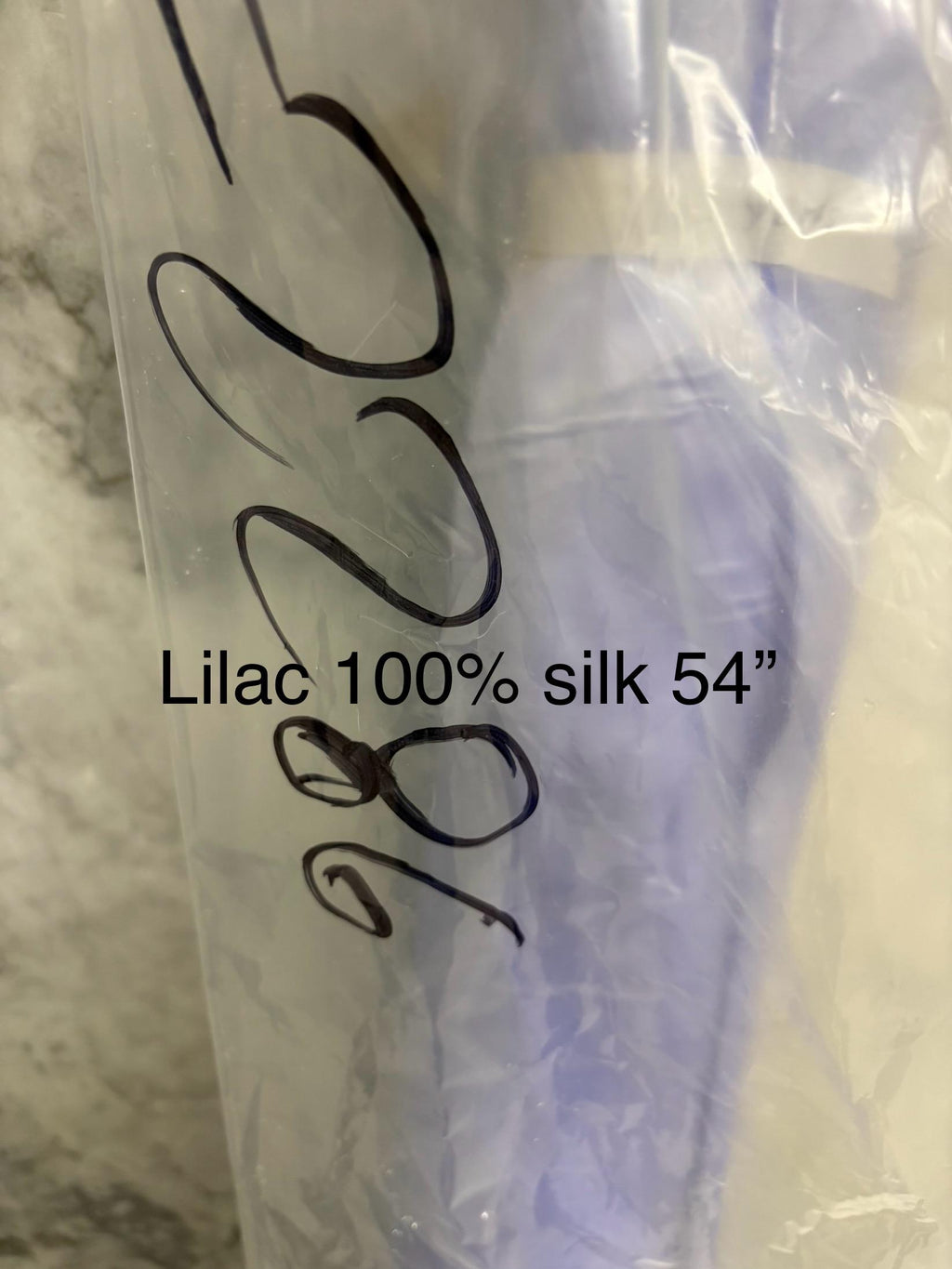 Lilac silk Taffeta width 54" color is Lilac with white warp. Machine made, fabric has thin slubs. Item NAS 2286