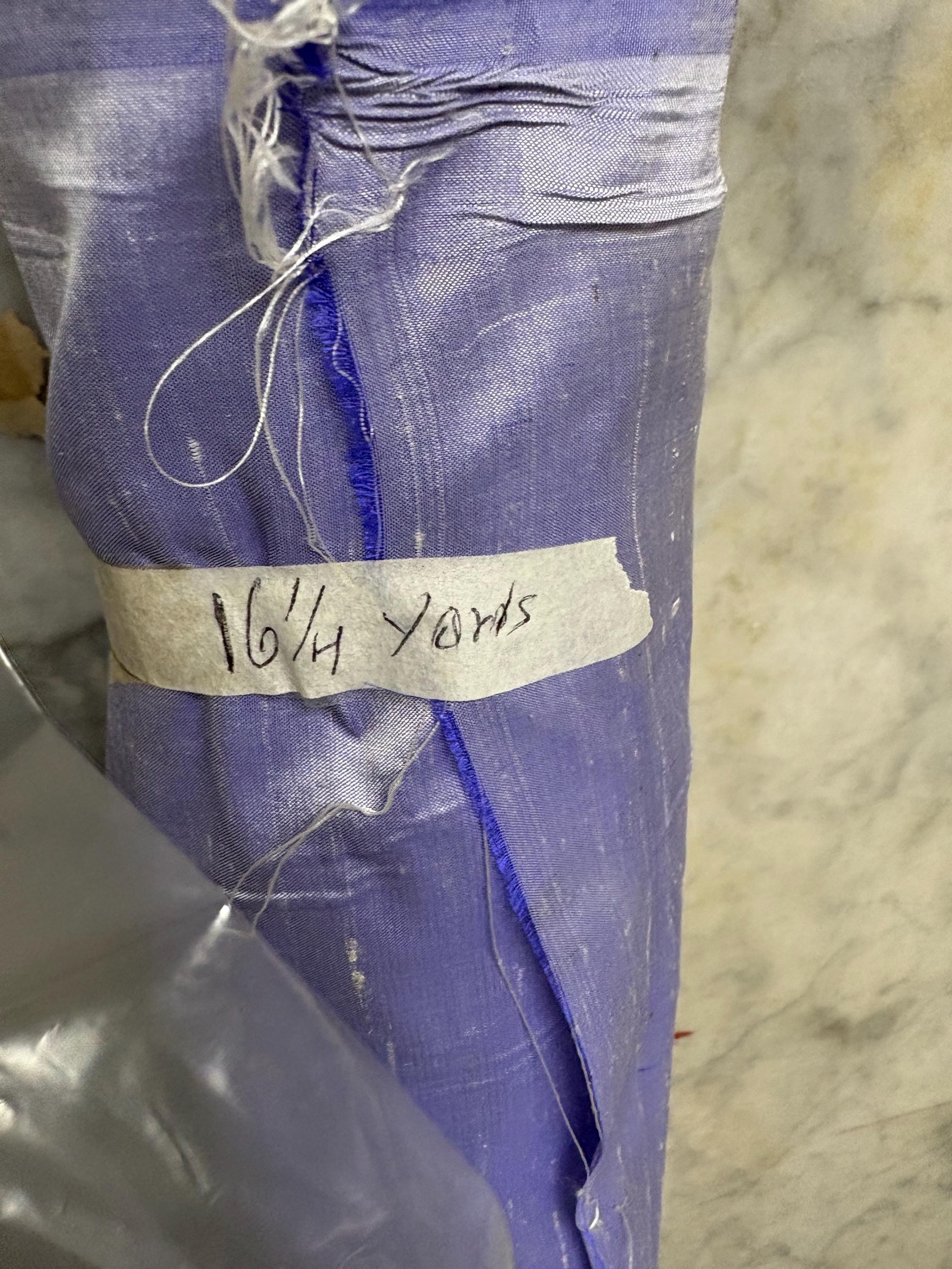 Lilac silk Taffeta width 54" color is Lilac with white warp. Machine made, fabric has thin slubs. Item NAS 2286