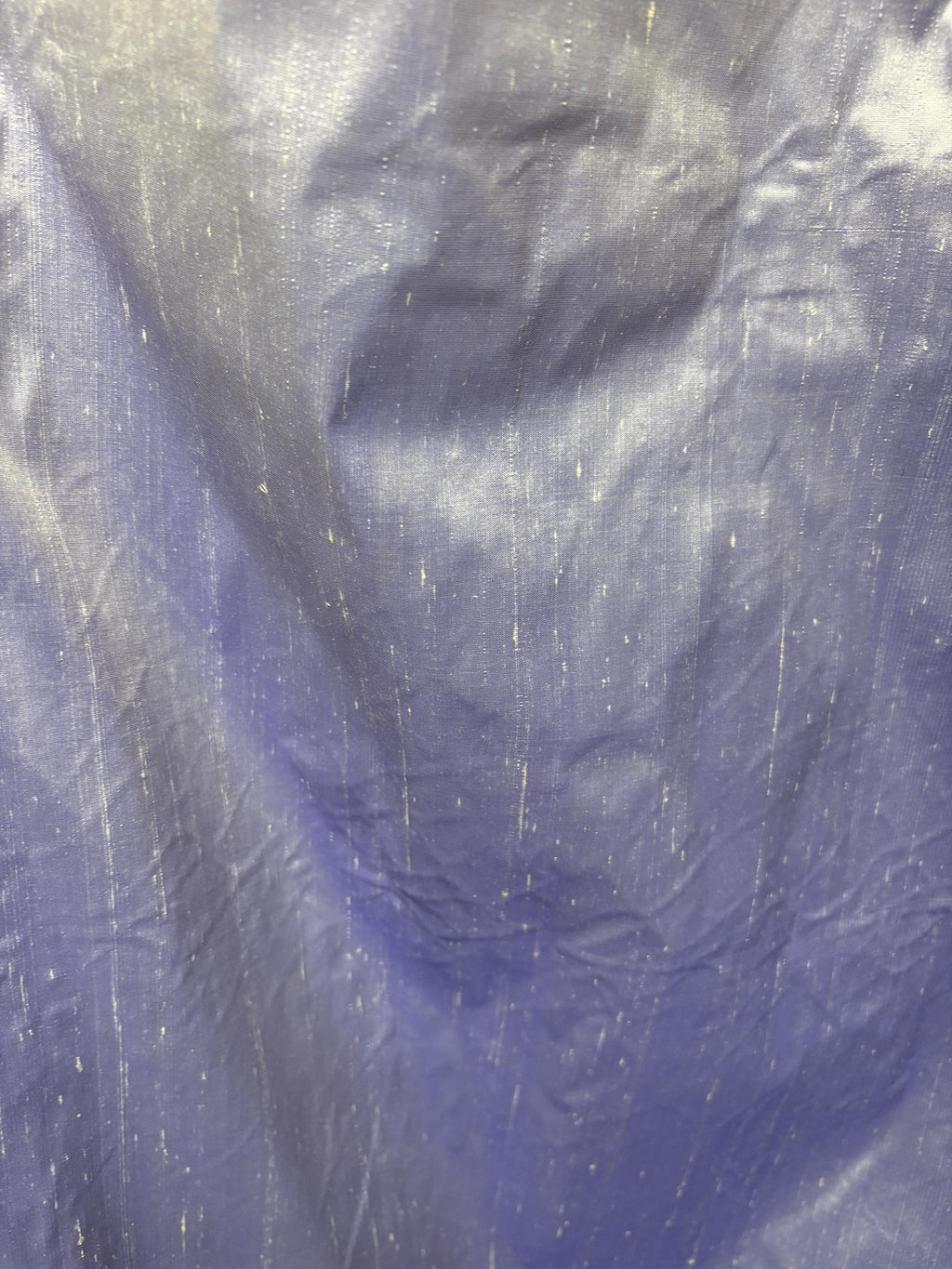 Lilac silk Taffeta width 54" color is Lilac with white warp. Machine made, fabric has thin slubs. Item NAS 2286