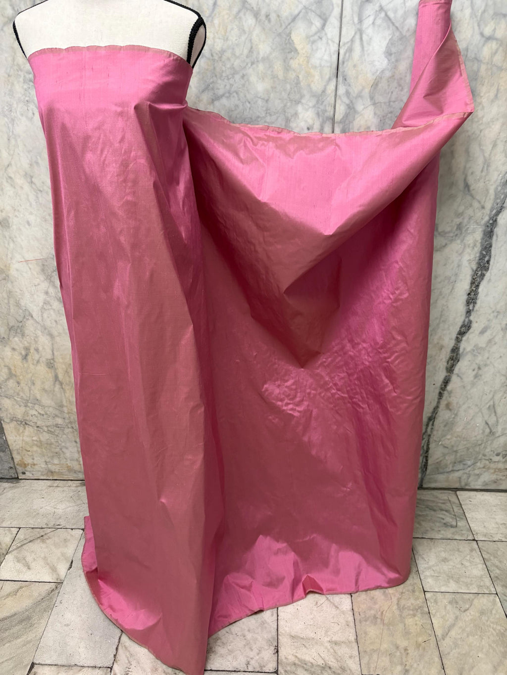 100% silk Dupioni Taffeta width 54" color Dusty Rose with green sheen. Fabric has slubbed. Check description. Item # 2259-2. NAS.