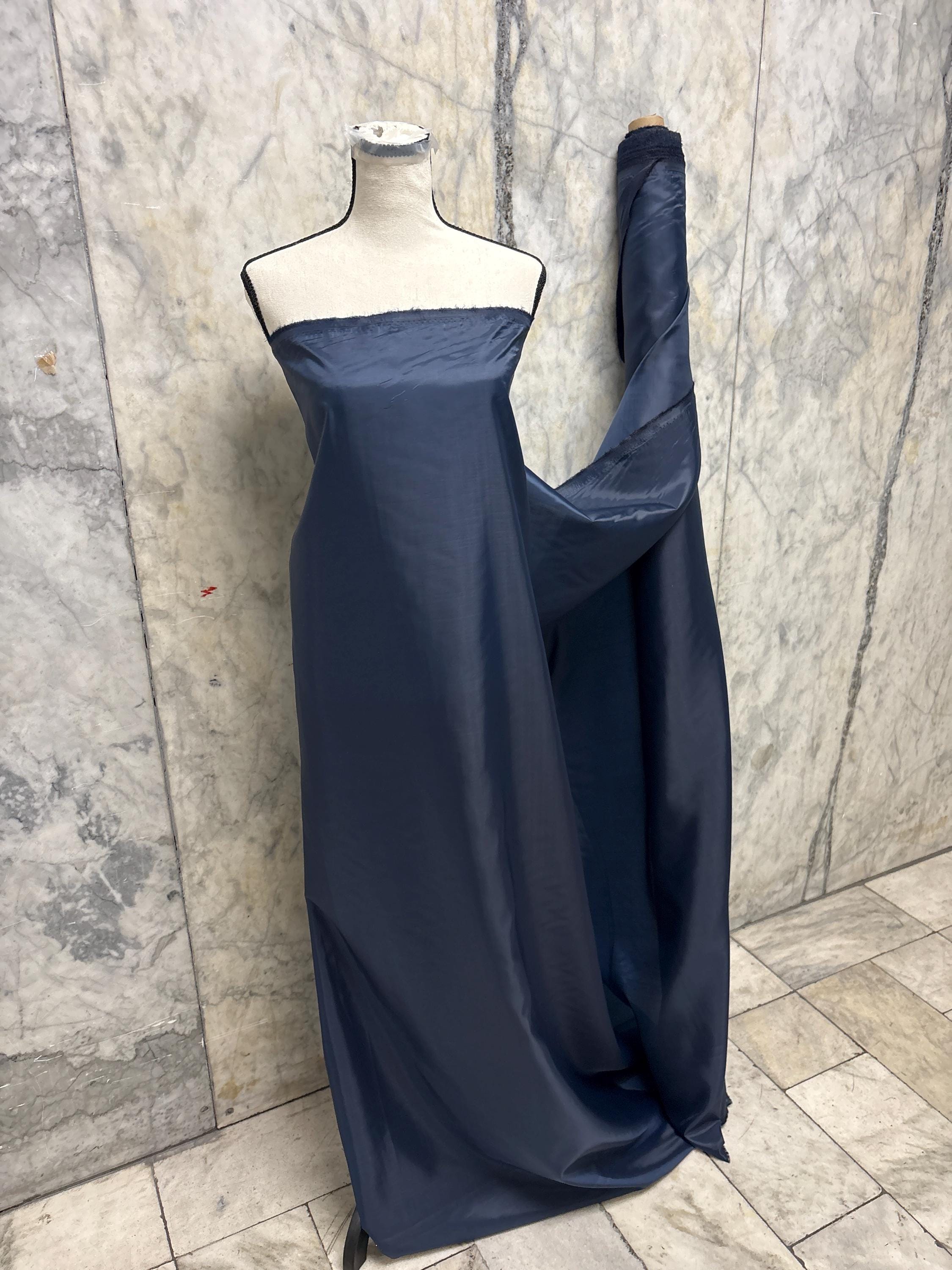 A 2 yards cut Lining fabric color navy, polyester, width 59", sell by 2 yards continuous.