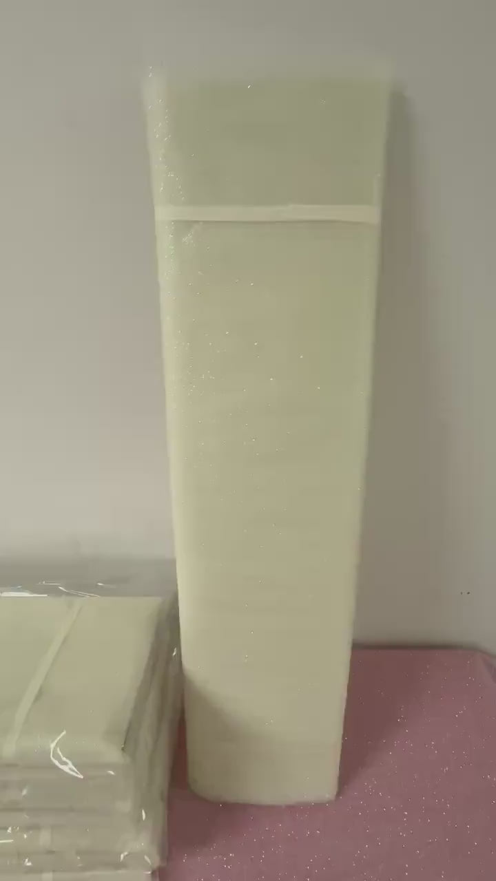 Ivory Tulle Gliter 54" double fold, color Ivory with unicorn glitter 10 yards per pack.