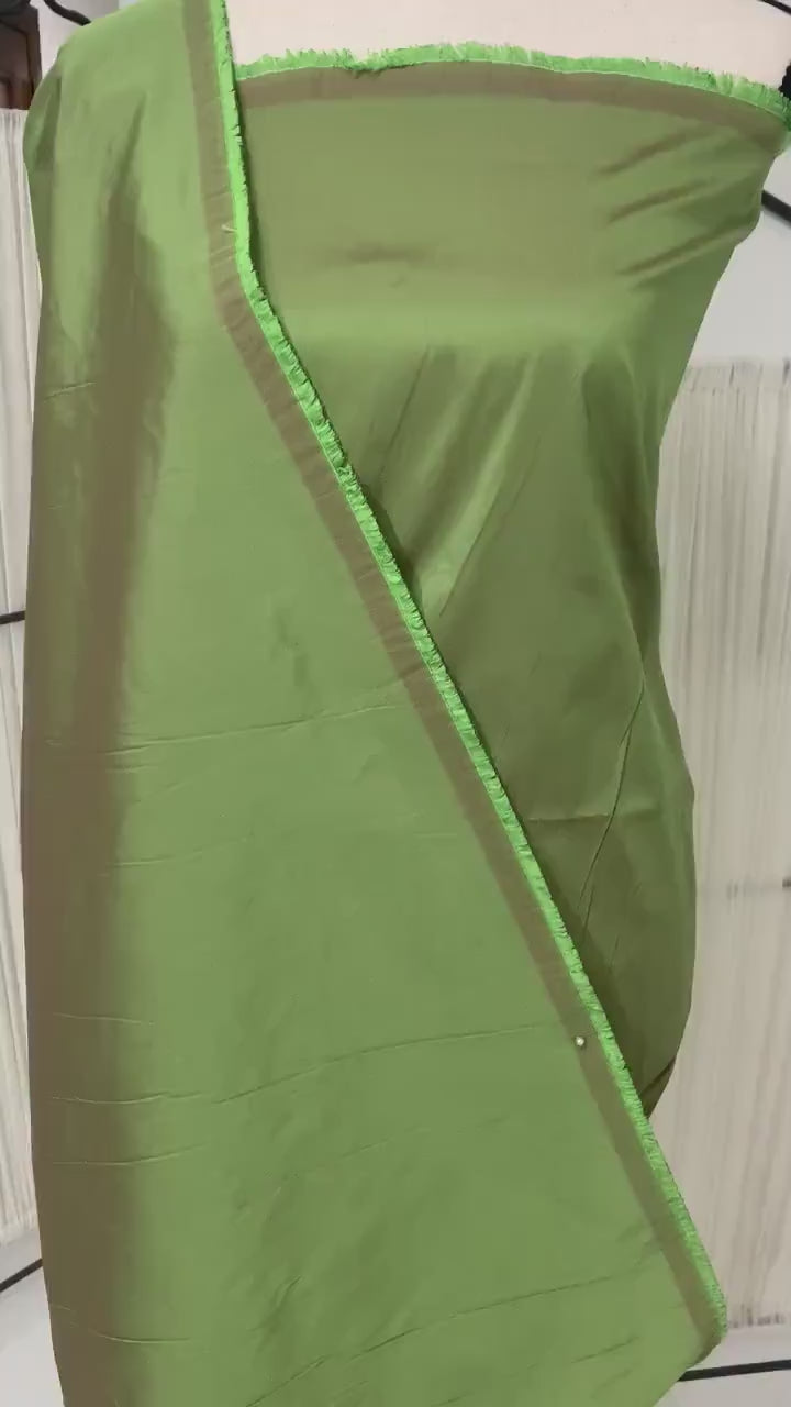 A 2 yards cut Olive Taffeta fabric . Two tone fabric width 58" polyester fabric has a tone of Fuchsia shading. FREE sample. item 115