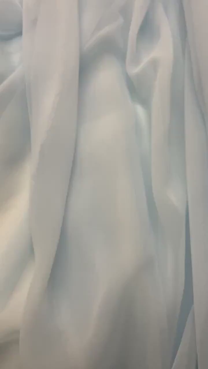 Lt. blue chiffon Fabric width 58/60 inches wide, sell and yards. Free sample Available for domestic address