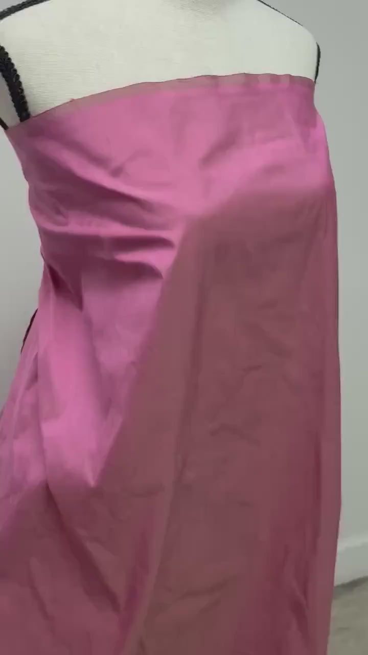 100% silk Dupioni Taffeta width 54" color Dusty Rose with green sheen. Fabric has slubbed. Check description. Item # 2259-2. NAS.