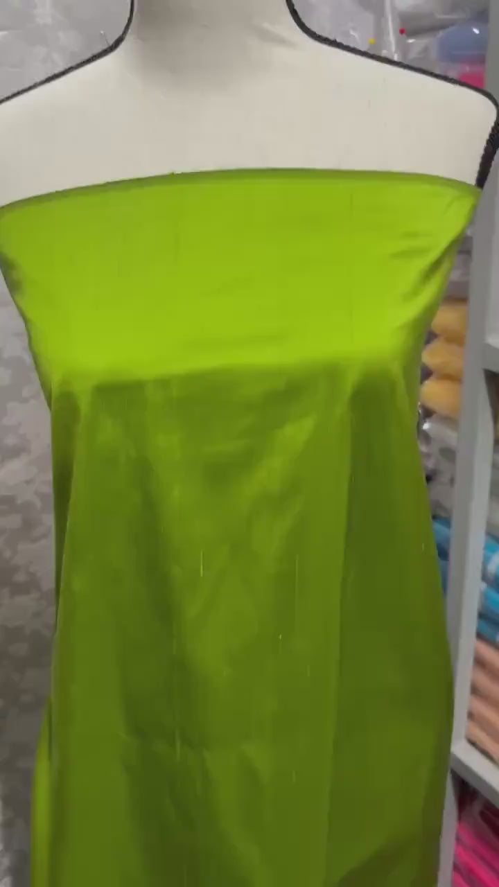 100% silk Dupioni Taffeta width 54" color is Lt.Olive. Machine made, fabric has slubs. Item # 4. free sample.