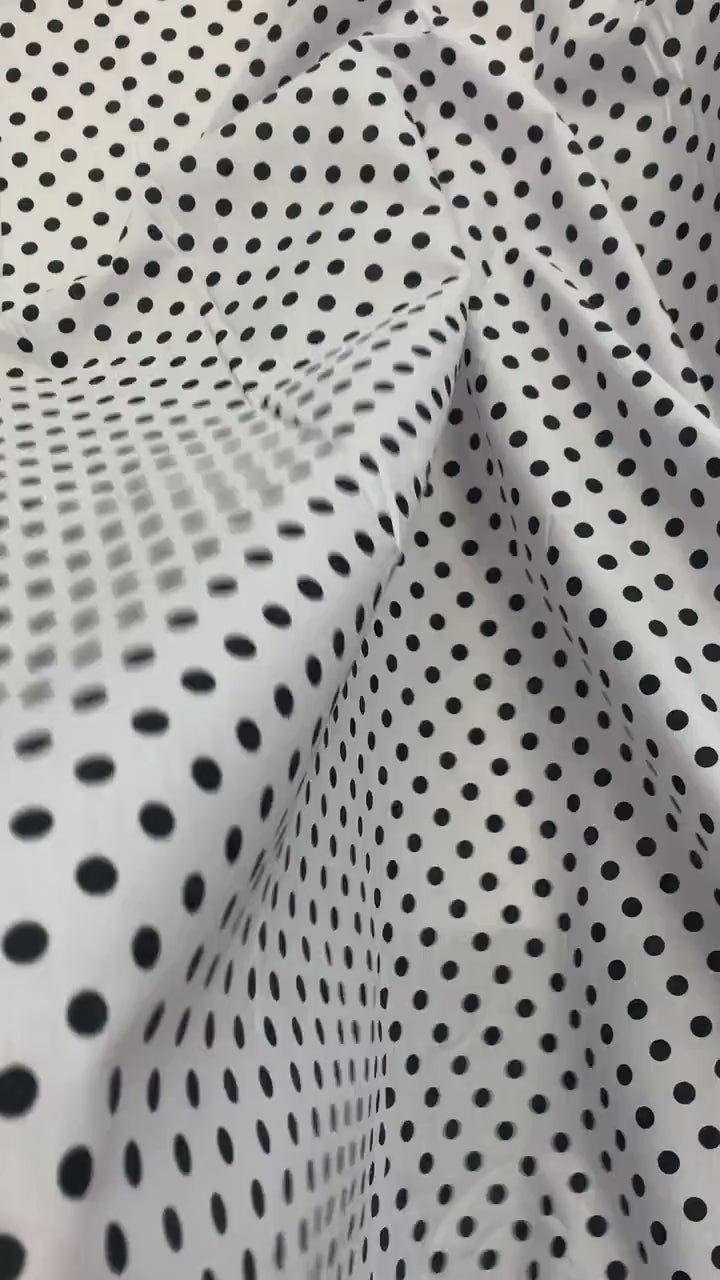 Polk dot fabric, width 57/58 inches, dot size is1/4 inch, 100% polyester broadcloth fabric, shirt weight. Available in 2 colors.