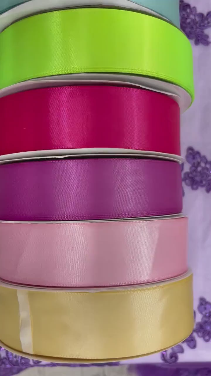 Roll of 100 yards Ribbon satin size 1.5 inch in 19 solid colors.