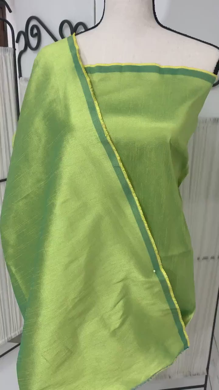 Olive poly dupioni fabric width 58". fabric has fuchsia tone, made of two different color of olive and turquoise blue. free smple.