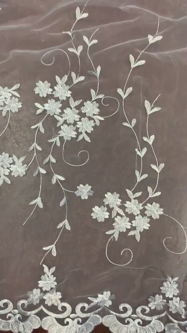 Organza Embroidery double scalloped color is combination of white/silver/ gray width 53/54" 100% polyester sell by yard