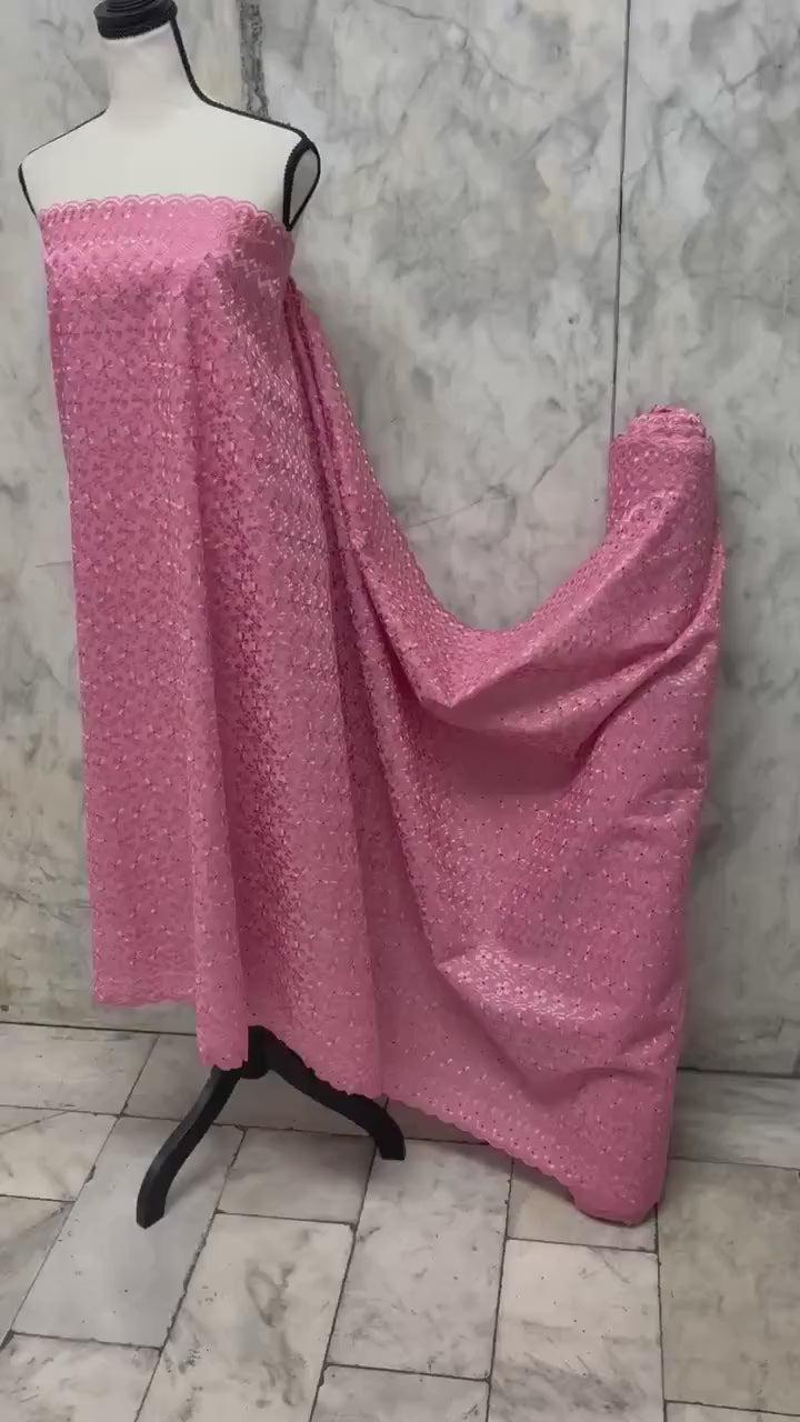 Eyelet fabric made of poly-cotton with all-over embroidery and double scalloped edges for a delicate finish. color Mauve design # 2