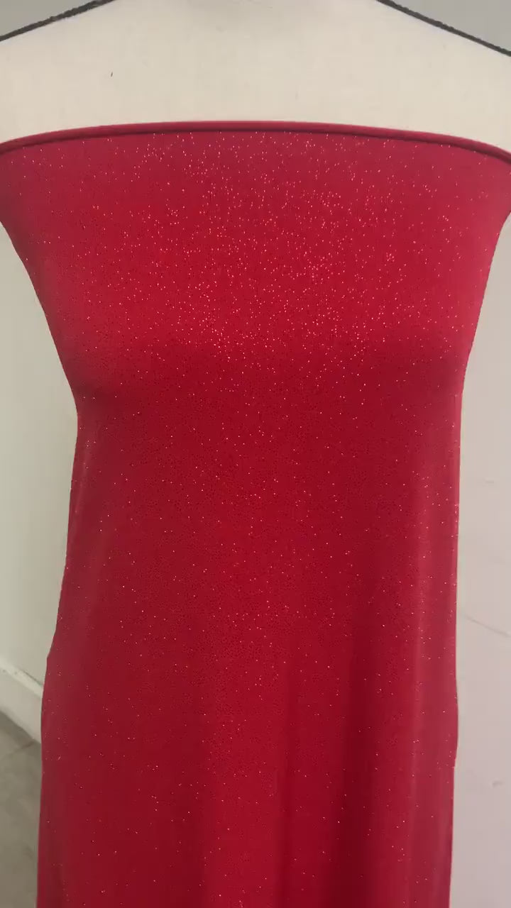 Red Gliter stretch Fabric width 58/60" , know as ity  sells by 1 yard continues increment. polyester spandex.