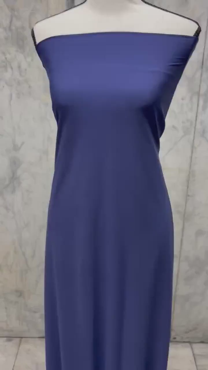 Navy ITY spandex fabric is an excellent choice for evening wear, known for its smooth texture and elegant drape. Sell by 1 yard increment.