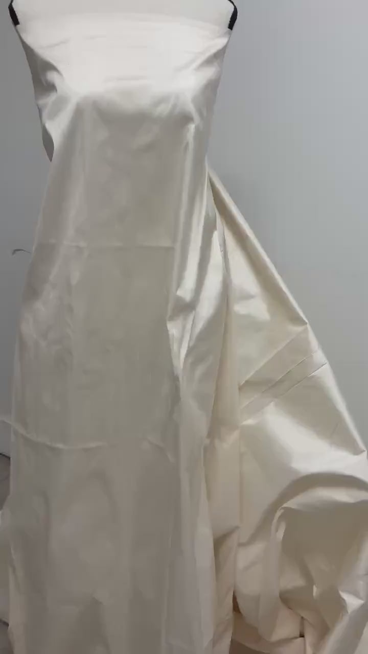 100% silk Dupioni Taffeta L. champagne 3.5 yards  width 54". Machine made, fabric has slubs. free sample. item # 1197