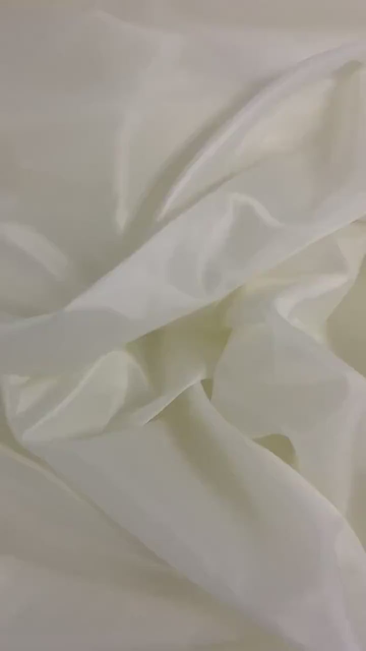 A 2 yards cut Ivory poly Lining fabric, 100% polyester, width 59". sells by 2 yard increment continuous