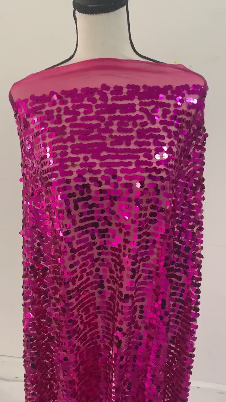 5 yards cut Fucshia sequence fabric.