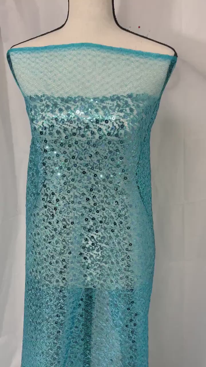 Turquoise Sequence mesh fabric, width 58", sell by yard, 3" plain mesh salvage on each side. great item for dress, costume, decoration.