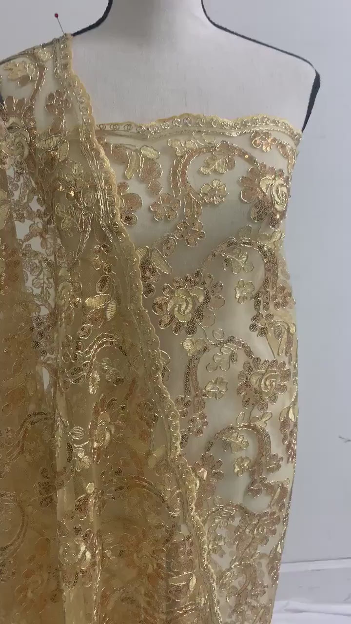 3-yard Gold-colored lace fabric design named Angela, sequins and intricate embroidery with double scalloped edges. Width 49/50"