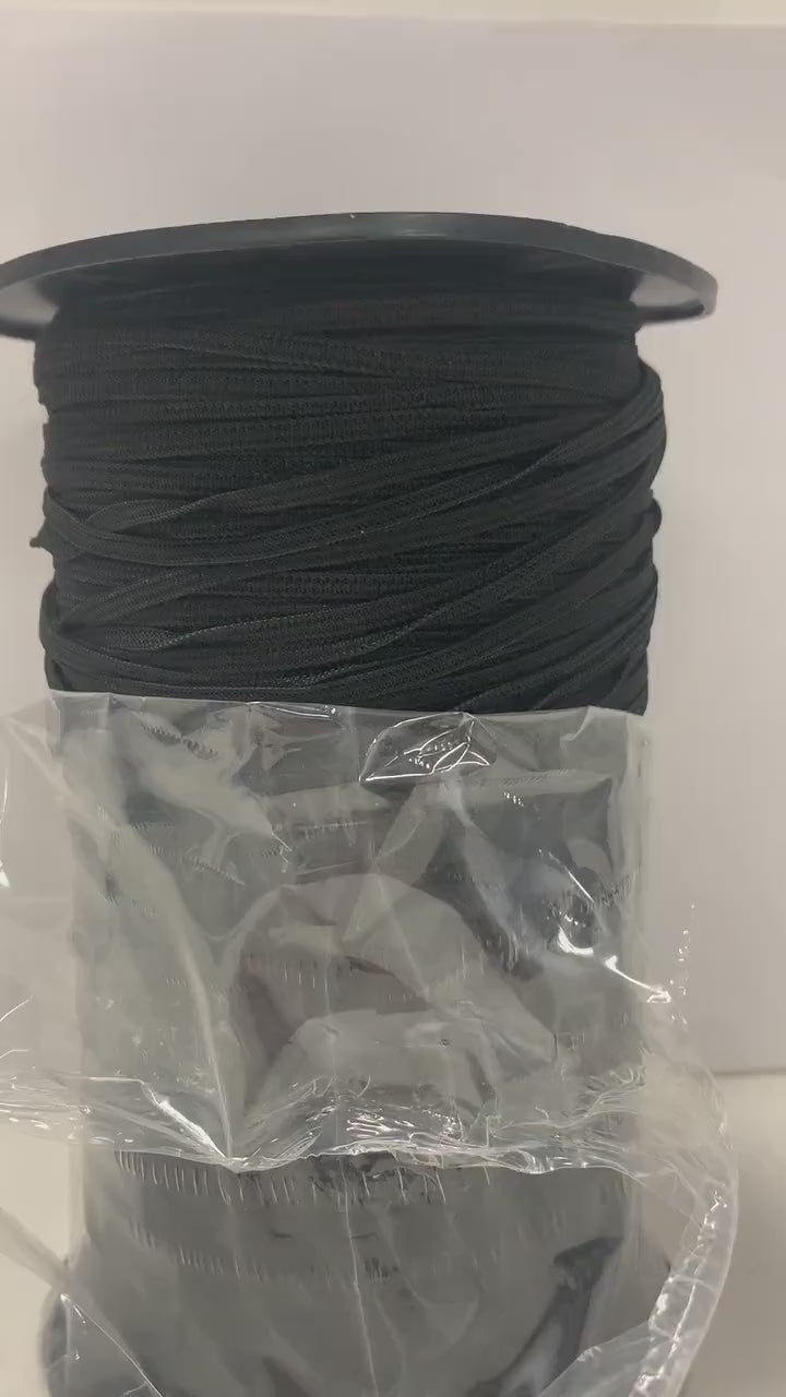 elastic color black width1/8 inch 300 yards per spool. More description , 1/8" Braided elastic string .