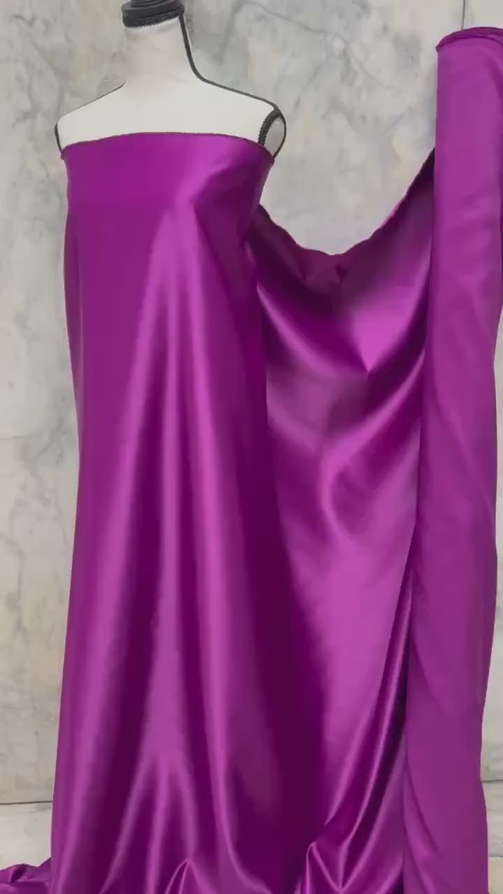 Bridal Satin Color Magenta 1473 dull finished, Polyester width 58/60" . Great for gown and suits, party formal dress.