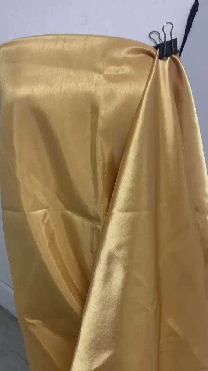 Antique Gold Slub Shantung Fabric width 58 inches polyester double sided dull and shiny.