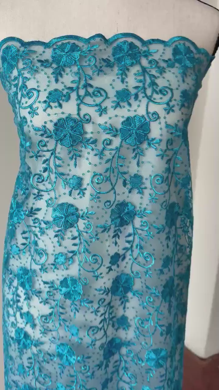 Turquoise lace fabric double scalloped embroidery sequence width 49". Design 04331279. shop with confidence ask fro free sample.