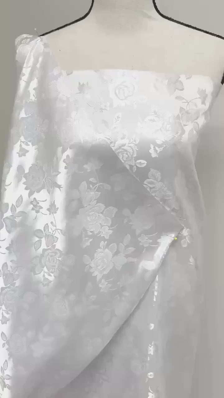 A 2 yards White Satin Jacquard fabric. width 58 inches, polyester sell by 2 yards continuous.